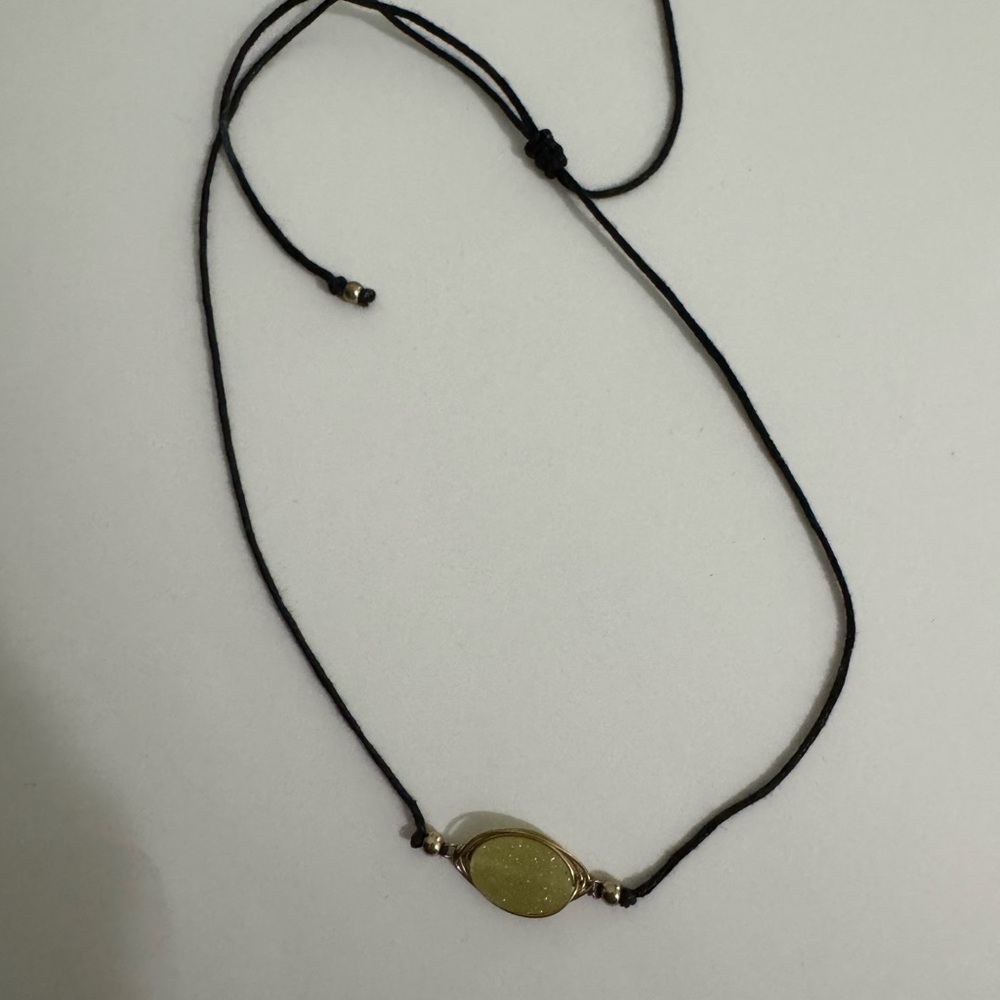 Adjustable Black Cord Necklace with Gold Oval Pendant